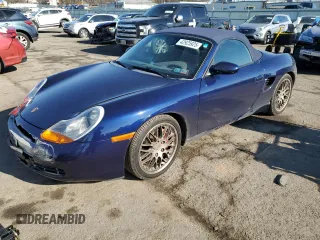 2002 Porsche Boxster S z VIN WP0CB29852U663748, wystawiony jako Copart lot #42925925 z przebiegiem 75 322 mil mil oraz Szkoda całkowita • Salvage title. Historia ofert i sprzedaży dostępna na DreamBid. Obrazek 1.
