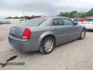 2007 Chrysler 300 Touring z VIN 2C3KA53G57H700084, wystawiony jako IAAI lot #42293480 z przebiegiem 156 839 mil mil oraz . Historia ofert i sprzedaży dostępna na DreamBid. Obrazek 4.