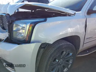 2016 GMC Yukon XL Denali with VIN 1GKS1HKJ7GR280505, listed as a IAAI auction lot 41694888 with 218,621 mi miles. Bid and sale history available at carsss.com. Image 6.
