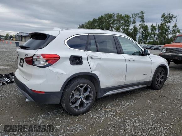 2016 BMW X1 xDrive28i z VIN WBXHT3C37GP882189, wystawiony jako Copart lot #56983985 z przebiegiem 45 700 mil mil oraz Szkoda całkowita • Salvage title. Historia ofert i sprzedaży dostępna na DreamBid. Obrazek 3.