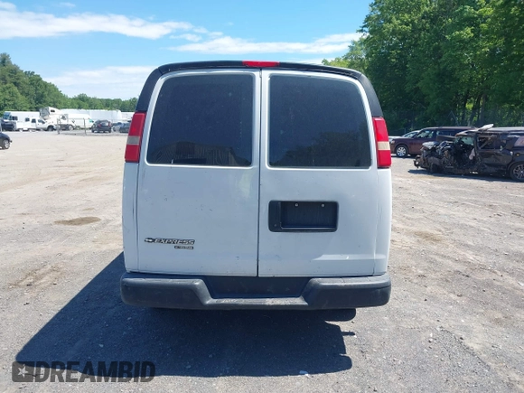 2014 Chevrolet Express Cargo Van with VIN 1GCWGFCA2E1210307, listed as a IAAI auction lot 39559260 with 213,814 mi miles. Bid and sale history available at carsss.com. Image 16.