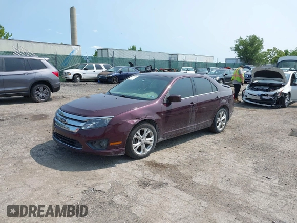 2012 Ford Fusion SE z VIN 3FAHP0HA6CR426765, wystawiony jako IAAI lot #42388306 z przebiegiem 120 016 mil mil oraz . Historia ofert i sprzedaży dostępna na DreamBid. Obrazek 17.