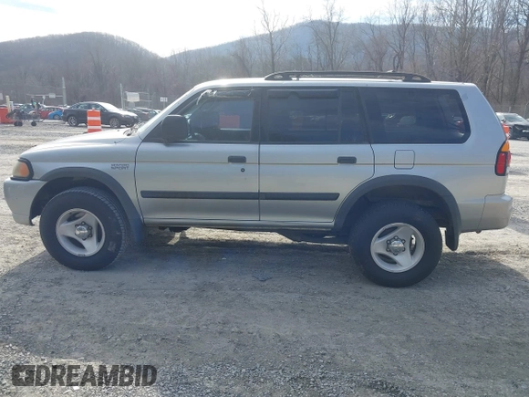 2000 Mitsubishi Montero LS z VIN JA4LS31H9YP005577, wystawiony jako IAAI lot #41590624 z przebiegiem 149 625 mil mil oraz . Historia ofert i sprzedaży dostępna na DreamBid. Obrazek 14.