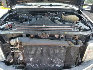 2010 Ford F-350 z VIN 1FDWF3HR4AEB31882, wystawiony jako Copart lot #66237185 z przebiegiem 94 829 mil mil oraz Szkoda całkowita • Salvage title. Historia ofert i sprzedaży dostępna na DreamBid. Obrazek 11.