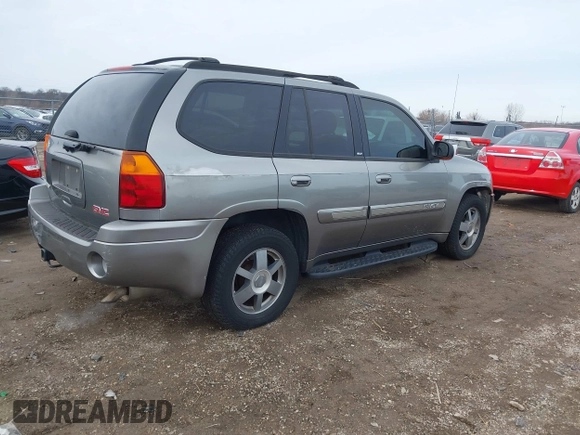 2005 GMC Envoy SLT with VIN 1GKDT13S352129944, listed as a IAAI auction lot 41527180 with 188,541 mi miles. Bid and sale history available at carsss.com. Image 4.