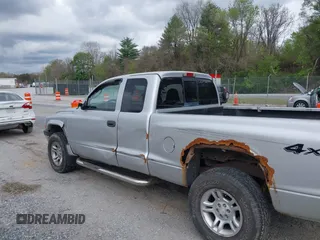 2003 Dodge Dakota Sport with VIN 1D7HG32N13S132871, listed as a IAAI auction lot 42059965 with 125,408 mi miles and . Bid and sale history available at carsss.com. Image 6.