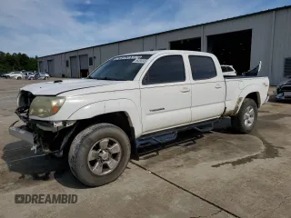 2010 Toyota Tacoma z VIN 5TEMU4FN7AZ710076, wystawiony jako Copart lot #56384345 z przebiegiem 215 043 mil mil oraz Szkoda całkowita • Salvage title. Historia ofert i sprzedaży dostępna na DreamBid. Obrazek 1.