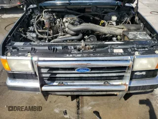 1990 Ford F-150 с VIN 1FTEF14N2LPA79988, выставлен на аукционе Copart как лот 57790775 с пробегом 34 347 миль миль и Чистый • Clean title. История ставок и продаж доступна на DreamBid. Изображение 11.