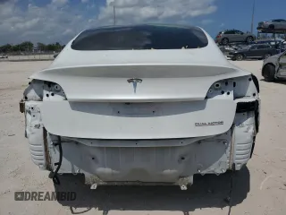 2019 Tesla Model 3 Long Range with VIN 5YJ3E1EB5KF418329, listed as a Copart auction lot 52183935 with 121,784 mi miles and Salvage Title. Bid and sale history available at DreamBid. Image 6.