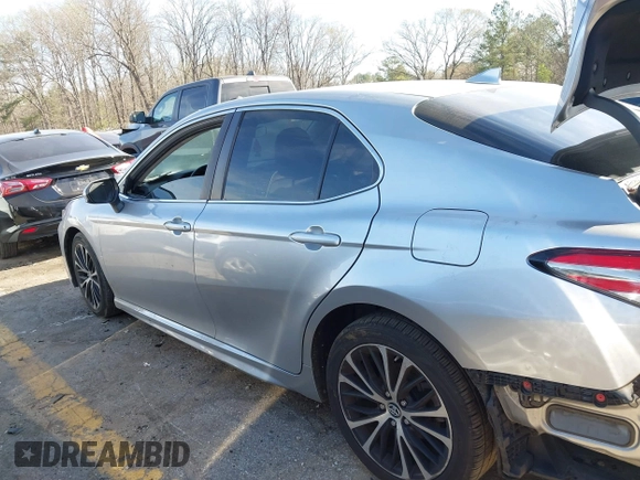 2019 Toyota Camry LE z VIN 4T1B11HK8KU681713, wystawiony jako IAAI lot #41823019 z przebiegiem 99 000 mil mil oraz . Historia ofert i sprzedaży dostępna na DreamBid. Obrazek 14.