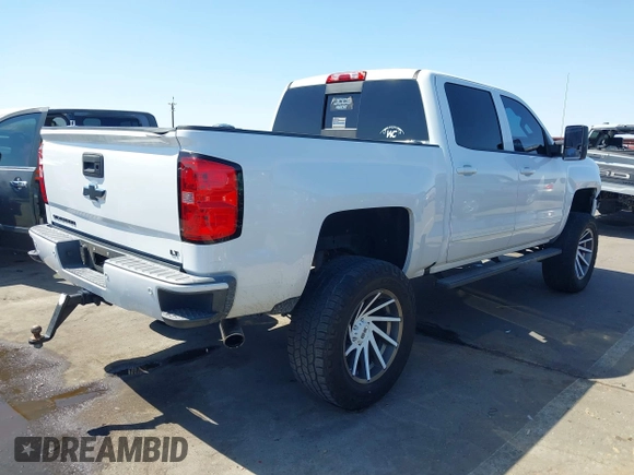 2016 Chevrolet Silverado 1500 LT with VIN 3GCUKREC5GG369915, listed as a IAAI auction lot 42082155 with 137,671 mi miles and . Bid and sale history available at DreamBid. Image 4.