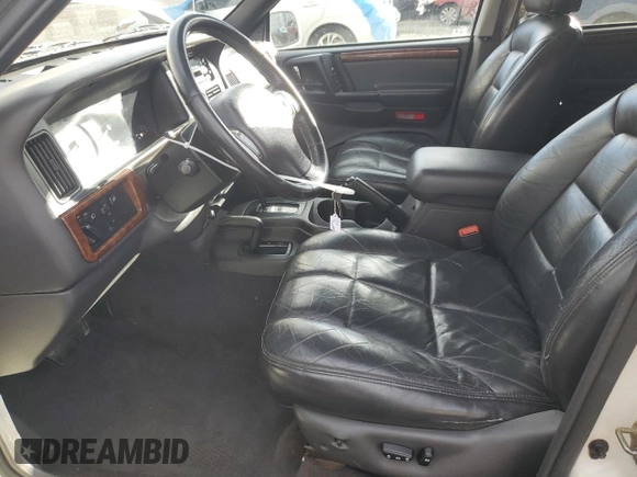 1997 Jeep Grand Cherokee Limited with VIN 1J4GZ78Y7VC772292, listed as a Copart auction lot 87692445 with 0 mi miles and Salvage Title. Bid and sale history available at carsss.com. Image 7.