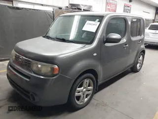 2011 Nissan Cube 1.8 SL with VIN JN8AZ2KR2BT212311, listed as a IAAI auction lot 42002493 with 128,372 mi miles. Bid and sale history available at carsss.com. Image 2.