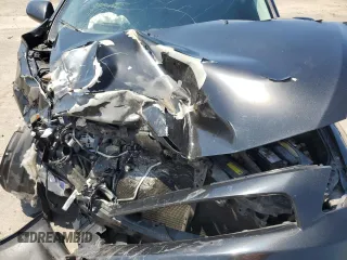 2005 Scion tC z VIN JTKDE177650047383, wystawiony jako Copart lot #55149305 z przebiegiem 176 083 mil mil oraz Szkody całkowita. Historia ofert i sprzedaży dostępna na DreamBid. Obrazek 11.