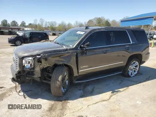 2019 GMC Yukon SLT with VIN 1GKS1BKC1KR117730, listed as a Copart auction lot 49438235 with 147,347 mi miles and Salvage Title. Bid and sale history available at carsss.com. Image 1.