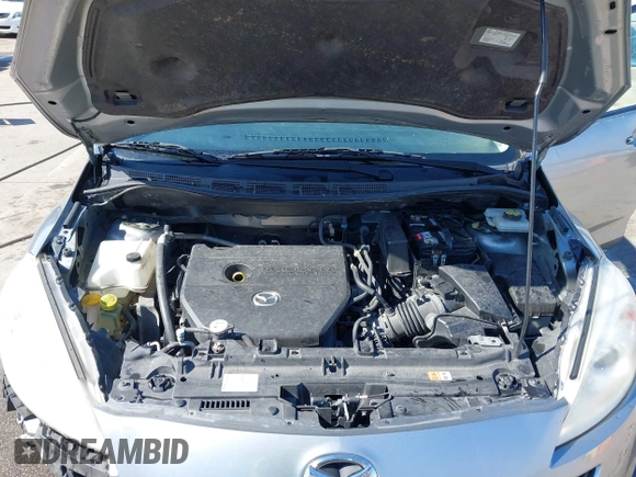 2013 Mazda 5 Sport with VIN JM1CW2BL6D0146696, listed as a IAAI auction lot 41657255 with 142,939 mi miles and . Bid and sale history available at DreamBid. Image 10.