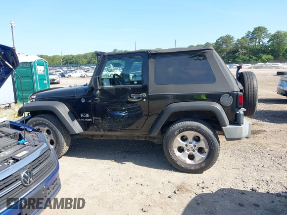 2009 Jeep Wrangler X with VIN 1J4FA24179L711352, listed as a IAAI auction lot 42577898 with 133,309 mi miles and . Bid and sale history available at DreamBid. Image 14.