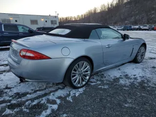 2010 Jaguar XK with VIN SAJWA4GB7ALB35518, listed as a Copart auction lot 86475814 with 32,910 mi miles and Salvage Title. Bid and sale history available at carsss.com. Image 3.