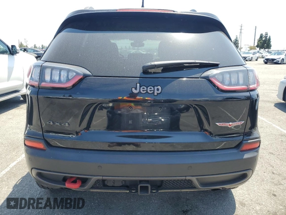 2021 Jeep Cherokee Trailhawk with VIN 1C4PJMBX8MD167153, listed as a Copart auction lot 54929845 with 52,800 mi miles and Clean title. Bid and sale history available at DreamBid. Image 6.