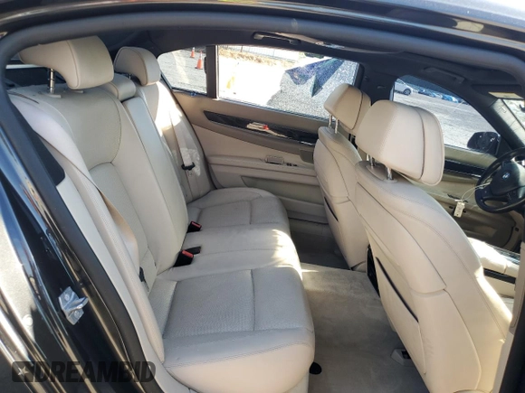 2013 BMW 7 Series 750Li xDrive with VIN WBAYF8C57DD140694, listed as a Copart auction lot 56983435 with 113,444 mi miles and Salvage title. Bid and sale history available at DreamBid. Image 10.