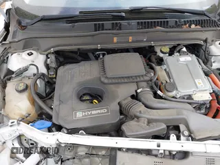 2013 Ford Fusion Titanium Hybrid with VIN 3FA6P0RU2DR308696, listed as a IAAI auction lot 41914944 with 133,710 mi miles. Bid and sale history available at carsss.com. Image 10.