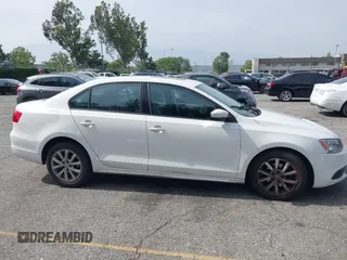 2012 Volkswagen Jetta SE z VIN 3VWDP7AJ3CM401411, wystawiony jako IAAI lot #42374516 z przebiegiem 222 317 mil mil oraz . Historia ofert i sprzedaży dostępna na DreamBid. Obrazek 13.