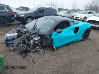 2023 McLaren Artura z VIN SBM16AEA2PW001787, wystawiony jako IAAI lot #41842771 z przebiegiem 2352 mil mil oraz . Historia ofert i sprzedaży dostępna na DreamBid. Obrazek 18.