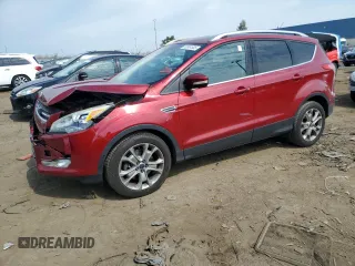 2015 Ford Escape Titanium with VIN 1FMCU9J93FUC90332, listed as a Copart auction lot 52861535 with 129,894 mi miles and Clean Title. Bid and sale history available at DreamBid. Image 1.