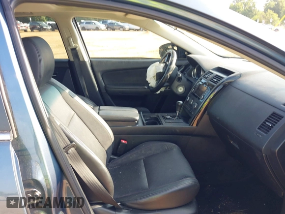 2014 Mazda CX-9 Touring with VIN JM3TB3CV7E0435659, listed as a IAAI auction lot 42428247 with 124,523 mi miles and . Bid and sale history available at DreamBid. Image 5.