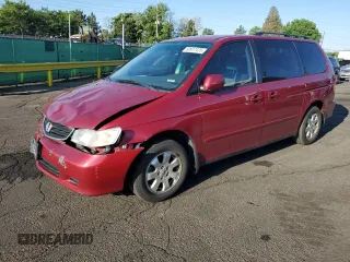 2002 Honda Odyssey EX with VIN 5FNRL18682B053112, listed as a Copart auction lot 60917475 with 196,237 mi miles and Salvage title. Bid and sale history available at DreamBid. Image 1.