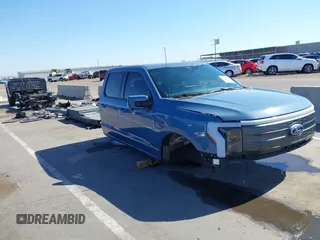 2023 Ford F-150 Lightning Pro z VIN 1FT6W1EV0PWG50635, wystawiony jako IAAI lot #41958663 z przebiegiem Nie podano mil oraz . Historia ofert i sprzedaży dostępna na DreamBid. Obrazek 1.