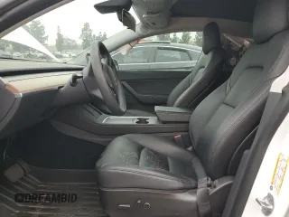 2022 Tesla Model Y Long Range z VIN 7SAYGDEE5NF352075, wystawiony jako Copart lot #50799895 z przebiegiem 11 597 mil mil oraz Szkoda całkowita • Salvage title. Historia ofert i sprzedaży dostępna na DreamBid. Obrazek 7.