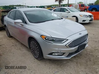 2017 Ford Fusion SE z VIN 3FA6P0HD5HR166433, wystawiony jako IAAI lot #42394998 z przebiegiem 121 333 mil mil oraz . Historia ofert i sprzedaży dostępna na DreamBid. Obrazek 1.