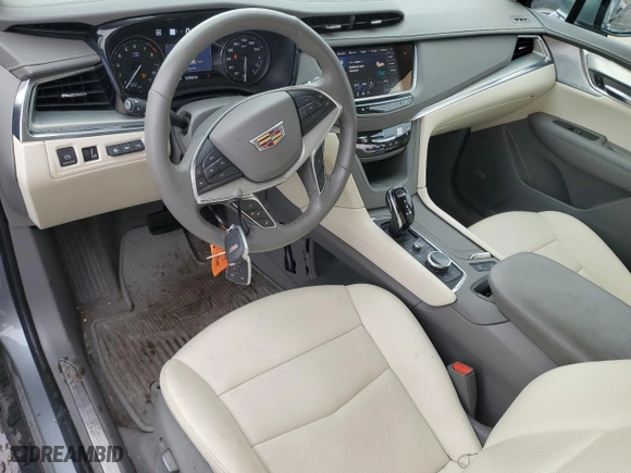 2023 Cadillac XT5 AWD Premium Luxury with VIN 1GYKNDRS6PZ195222, listed as a Copart auction lot 43034615 with 12,052 mi miles and Salvage Title. Bid and sale history available at carsss.com. Image 8.