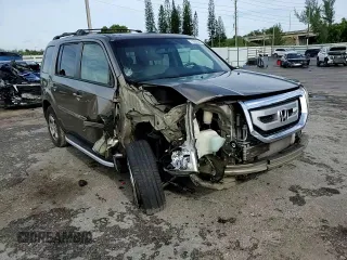 2010 Honda Pilot Touring with VIN 5FNYF3H81AB016255, listed as a Copart auction lot 71052644 with 96,847 mi miles and Salvage Title. Bid and sale history available at DreamBid. Image 11.