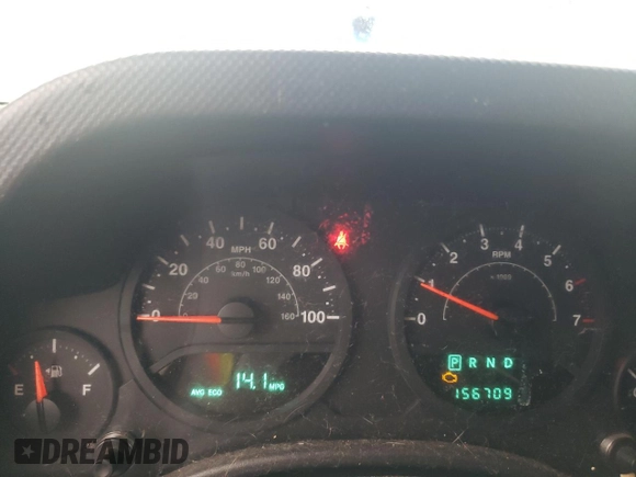 2009 Jeep Wrangler X with VIN 1J4FA24109L712701, listed as a Copart auction lot 60800855 with 156,709 mi miles and Salvage title. Bid and sale history available at DreamBid. Image 9.