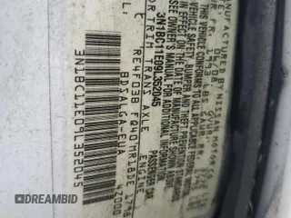 2009 Nissan Versa S z VIN 3N1BC11E09L352045, wystawiony jako Copart lot #46843955 z przebiegiem 170 741 mil mil oraz Szkoda całkowita • Salvage title. Historia ofert i sprzedaży dostępna na DreamBid. Obrazek 13.