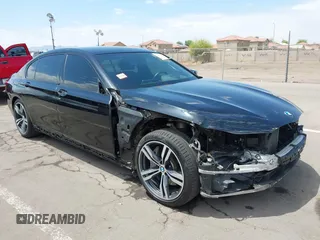 2018 BMW 7 Series 750i with VIN WBA7F0C59JGM23332, listed as a IAAI auction lot 42215338 with 61,911 mi miles and . Bid and sale history available at DreamBid. Image 1.