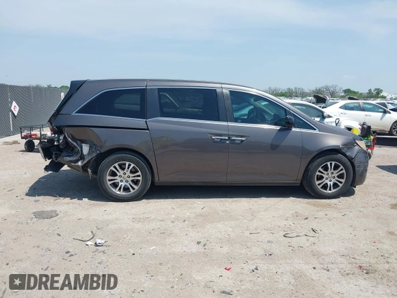 2012 Honda Odyssey EX with VIN 5FNRL5H41CB011940, listed as a IAAI auction lot 42033966 with 182,996 mi miles and . Bid and sale history available at DreamBid. Image 13.