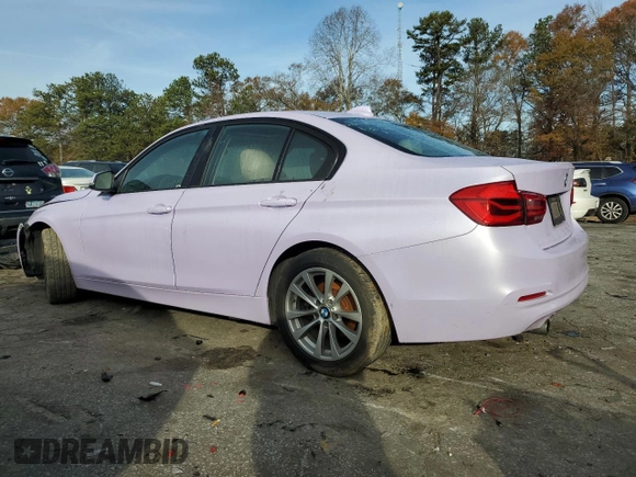 2018 BMW 3 Series 320i with VIN WBA8A9C55JAH12818, listed as a Copart auction lot 52110515 with 72,522 mi miles and Salvage title. Bid and sale history available at DreamBid. Image 2.