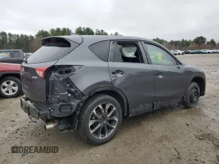 2016 Mazda CX-5 Grand Touring with VIN JM3KE4DY6G0834583, listed as a Copart auction lot 52015905 with 184,741 mi miles and Salvage Title. Bid and sale history available at DreamBid. Image 3.