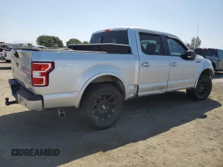 2018 Ford F-150 XL with VIN 1FTEW1CGXJFB40297, listed as a Copart auction lot 69642404 with 92,561 mi miles and Salvage title. Bid and sale history available at DreamBid. Image 3.