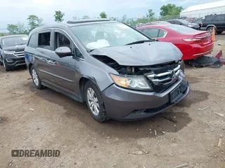 2015 Honda Odyssey EX-L z VIN 5FNRL5H67FB049842, wystawiony jako IAAI lot #42231377 z przebiegiem 140 539 mil mil oraz . Historia ofert i sprzedaży dostępna na DreamBid. Obrazek 1.