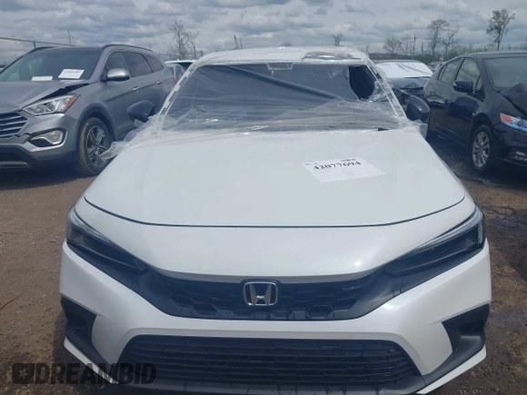 2023 Honda Civic Sport with VIN 19XFL2H80PE022752, listed as a IAAI auction lot 42077694 with 25,939 mi miles and . Bid and sale history available at DreamBid. Image 12.