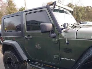 2009 Jeep Wrangler Rubicon z VIN 1J8GA64169L743008, wystawiony jako IAAI lot #41792451 z przebiegiem 142 414 mil mil oraz . Historia ofert i sprzedaży dostępna na DreamBid. Obrazek 13.