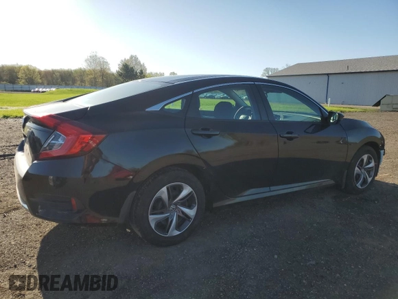2019 Honda Civic LX with VIN 19XFC2F60KE025306, listed as a Copart auction lot 53949305 with 50,671 mi miles and Salvage Title. Bid and sale history available at DreamBid. Image 3.
