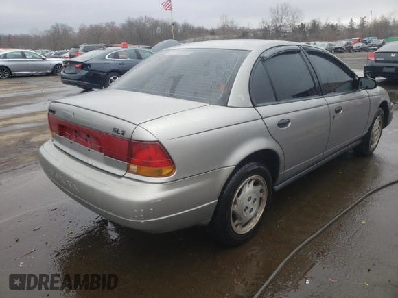 1996 Saturn SL with VIN 1G8ZK5272TZ265571, listed as a Copart auction lot 51267475 with 142,824 mi miles and Salvage Title. Bid and sale history available at carsss.com. Image 3.