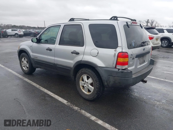 2002 Ford Escape XLT Choice with VIN 1FMYU04192KA82503, listed as a IAAI auction lot 41521335 with 128,349 mi miles. Bid and sale history available at carsss.com. Image 3.