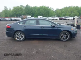 2020 Ford Fusion SEL z VIN 3FA6P0CD9LR183400, wystawiony jako IAAI lot #42271491 z przebiegiem 52 020 mil mil oraz . Historia ofert i sprzedaży dostępna na DreamBid. Obrazek 13.