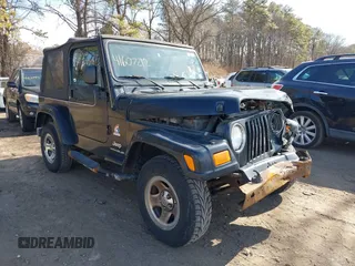 2003 Jeep Wrangler X with VIN 1J4FA39S53P362991, listed as a IAAI auction lot 41607212 with 240,556 mi miles. Bid and sale history available at carsss.com. Image 1.